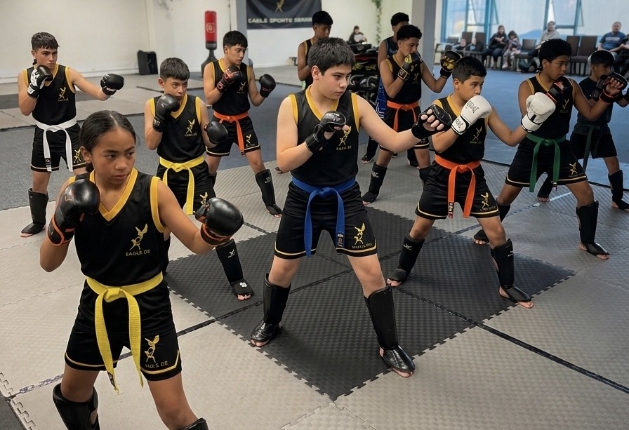 Teen students training across belt grades at Eagle DS